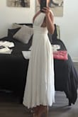 This dress was a different material than I was imagining; it's closer to a linen material, which makes it a tad more casual in person IMO. But overall love this dress and am keeping it. I got a small, and it fits perfecttt but there is zero wiggle room. So if you are debating between sizes, maybe size up? I also feel like it's pretty supportive! I don't have a large cup size, but I feel like even if you do, the straps are fitted enough that it kind of holds you in. Also, zero side boob (for me). Big fan of this dress. Should be super flattering in photos too! - Aspen
