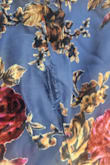 I want to start off by saying the silhouette of the dress is lovely and the fabric/print is beautiful, BUT the outer shell ripped as soon as I tried it on.

I'm usually a medium but I sized up to a large. The large fit beautifully. Everything was great until I noticed separation of the seams after just trying it on.

I ordered this for a last minute invitation to a gala and had nothing else to wear. I reinforced the seams on my own, and those are the only places the fabric didn't rip.

I got a shawl to hide the rips in the bodice. I was constantly covering myself it to hide them. It was such a bummer. I really wish it would have been a functional dress. - Tricia C.