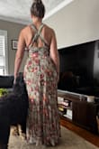This dress fit perfectly. I was really happy. The length was true to what the photo showed on the website. I am 5' 8, 155 lbs. The dress comes down to my feet which is exactly what I wanted. It is very well made with layers under the dress so it is not see through, but also not too heavy for a warm day. - Kara W.