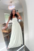 Such a beautiful milky white dress! I debated wearing this for my wedding, but ended up wearing it for my rehearsal instead! The fit is so flattering, and no one would think it was under $100! So beautiful and classy!!!!! - Jenna B.