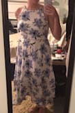 I got this for my upcoming bridal shower. I have a chubby apple shape, and this dress  is flattering. And it's WHITE, which is every size 8/10's nightmare.

It does run tight.  I happened to be wise enough to order both a medium and a large -- based off of the reviews I read -- even though I am always a medium on this site.  I'm keeping the large, although I could have made do in the medium. I just wouldn't be able to eat cake at the shower! Haha.

The top is a little loose -- made for larger-busted women than I. I'm going to try to take it in myself, so I'm going to keep it.  (I wear a 34D but it's more my broad shoulders than my actual breast size).  

Everyone who has seen it so far loves it! - Jenna B.