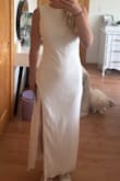 The dress was good, but I didn't find it super flattering on me. It was a little boxy through my waist and just didn't really do anything for me. The length was good. I ordered an XS, and I am roughly 5'3. It's a little see-through but not too bad. Should be fine if you wear nude undergarments. I'm returning because I like a different dress I ordered more. - Meghan W.