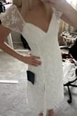 I love this dress so much. I wore it for my engagement photos. I'd give it 5 stars, however, first time putting it on and the tie was about to break. Hanging on by a thread. Bummer. - Hannah M.