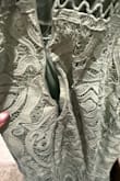 Horrible! When I zipped it up, it zipped up and then there was a spot that went off the track. Then zipper wouldn't zip down and was stuck. I had a gap that I had to use safety pins! Horrible night. I did not have a backup dress for my daughter's quinceañera! - Amy G.