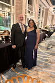 The dress is stunning. Formal and gorgeous!  The blue is not as dark as pictured; it's not navy blue. The sash also appears to be lined, but it's not; it's sheer. The dress runs large; order a size smaller than normal. I still had to get it altered, despite ordering a size smaller. I can't wait to wear it again. - Josie T.