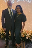 The dress is a beautiful dark green color. It's much longer than pictured, but doesn't require heels. It's really thick material, so great for cooler weather. It hugs you all over, so it appears more formal than it looks on the hanger. I loved that it was so comfortable to wear. - Josie T.