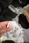It has some stretch but not too much. Definitely no boob support so you'll need a bra or stickies to hold them up. Mine was missing the clasp part but I don't have time to return and wait for a replacement. It's a lovely dress. Buttons on the back are cute. Its simple but nice for the occasion. Also recommend a seamless spanx if you go that route. Overall lovely dress - Jhayde S.