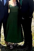 Wore this to a wedding in the Redwood forest & it went perfectly with the venue and theme (Pics are from the beach nearby). Got so many compliments. The green is truly emerald & material was not see through, which I was a little worried about. I got an XL bc I was tight on time & wouldn't be able to return, but definitely could've worn my true size (L). - Lindsey G.