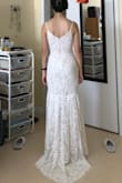 I bought this dress as a possible wedding dress. I really loved the train and the length was perfect with 3" heels. The fit was perfect too. However I did not like the seam on skirt and the top was a little lackluster. I wanted to love it but it just didn't work out. - Wendan L.