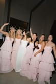 I chose this pink dress for my bridesmaids. They loved it. It's flowy, strapless, unique, and flattering. Perfect instead of a tight satin dress. They danced comfortably all night. Would recommend!! - Graceanne M.