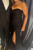 I bought this as a guest for a black-tie wedding. It is a gorgeous, lightweight floral lace overlay material. It has no stretch, so a tight fit at the waist and hips. I am usually a size Medium, but returned it for the Large, and it was perfect! In person, it looks more expensive than it is and is a perfect length. The high slit and sweetheart neckline give it a very sexy look and feel! It is a beautiful dress, I got a lot of compliments and felt confident moving and dancing all night. My only complaint was the top edge of the neckline began to roll forward midway through the night; next time, I will put body tape at the top of the bustline to prevent the roll. I've included one pic that shows the roll down. I highly recommend this beautiful and affordable dress!! - Brooke K.