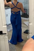 The pink is near see-through, I recommend the blue instead. It's not forgiving at all if you have even the slightest belly. The length is ridiculously long, I will end up taking off 6-8 inches. I love the scrunch detail on the rear and the strappy back. - Maggie S.