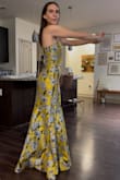 I absolutely LOVE this dress, and I think it's extremely flattering. I'm 5'5, 115 lbs, flat chested with a bigger butt, and it hugs my body perfectly. It's longer in the back, which is really pretty. - Kady B.