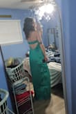 Good fit, but I couldn't get myself to love the color in person. Everything else about the dress was decent, though. The style of the dress is super cute. I'm between xs/s (size 2) and glad I got the xs bc it's strapless and I'm not super busty - it fits perfectly! - Natalee B.