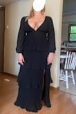 This dress is revealing for women with larger chests. If you don't mind cleavage, it holds the chest well without a bra. It is a no stretch material, but the bottom is very flowy and free moving. Comfortable, especially for events where you may be eating or feel bloated. Highly suggest. (These were the only pictures I took) - Raia R.