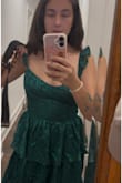I love it. The fit is great. The fabric is great. The color is great. The quality is great. It's fully lined! The straps are a little long, but it's an easy fix. I'm wearing it for a mountain wedding. - Anna-Marie C.