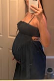 Love this dress! I got it for maternity photos. I didn't size up and it's a little snug but not enough for me to order a different size. This way I can still wear after baby is here! The material is great and looks just like the photo. - Brooklyn B.