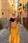 Perfect for a day in Sorrento, Italy! The small was right around the bust. The medium was big, but thankfully the tie around the bust was adjustable, so I could tighten it enough. It stayed in place to make me feel secure all day. - Felisha B.