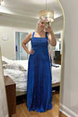 I'm obsessed with this dress. Tried it on without bra and it fit perfectly. I'm in size 12 jeans if that helps. - Rose W.