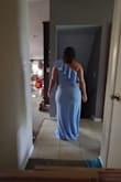 This dress was beautiful. I love the stretch material but it just did not flatter my curves. Also this is VERY long for someone that is 5ft. I'm 5ft 145lbs and it just wasn't the dress for me. - Tita W.