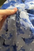 The dress is really pretty, but the mesh layer is super fragile, so it split from the lining after one use. The fit near the seam was a bit large, so it seems like it could have been a loose thread. It's pretty disappointing that it barely lasted one night. - Molly B.