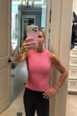 I absolutely love the look and feel of this ribbed tank! I love it so much that I am ordering it in all the colors that are available. I really like the length of it too. It's perfect! Not too long or too short. I like the hem it has by the waist too. You could tuck some of the front in, tuck it all in or just wear it shown in the pictures I've attached. Oh and it washes great!! - Wendy R.