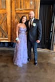 I bought this dress for my daughter's wedding, so it served as my Mother of the Bride dress. I received so many compliments on this dress. I had to have it hemmed because it was very long even with my 4 inch heels. I added a rhinestone belt to add a formal appearance to it and also had my seamstress take the excess fabric to use as the lace-up in the back because I didn't like how small the string was that came with the dress. All in all, beautiful dress! - Heather D.