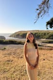 This dress fits super comfy! It's the perfect length. Great quality, however, it does snag super easily. The material is super comfy, very light. The perfect dress for a family beach photoshoot! - Bethany W.