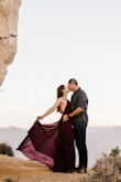 I chose this dress for my engagement photoshoot at the Grand Canyon and it did NOT disappoint! It flowed in the wind beautifully, it's lightweight, and the straps are adjustable. However, it was cold at the Grand Canyon... so make sure you get some pasties to cover up the girls! It was long on me but I didn't want it to be hemmed for this shoot. I got so many compliments on it too! - Alex V.