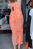 I love this dress so much!!! It's more neon than the picture but I actually personally like that better! Because it was more neon I eventually went with another dress for a wedding I was attending but I loved it so much I'm ready to wear it to a beach, vacay or summer night out!! It fit really nicely and very comfortable:) - Hannah J.