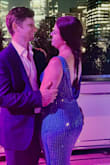 I LOVE this dress. I don't think I've ever received as many compliments on any other article of clothing ever than I did in this dress! That being said, head's up: it's SUPER heavy because of the multitudes of tiny mirrors and it runs long as is. I'm 5'7" and about 165 lbs so ordered a size large (those curves need space and the liner doesn't stretch at all) AND I wore 5" heels. Between the established long length and the weight of the dress, the external mirrored layer stretches out a bunch throughout the evening (while the liner didn't stretch at all). By the end of the night I was nearly tripping over it. GORGEOUS dress but be prepared for the stretch and weight of it. Maybe look into tailoring the hem and/or tailoring the top straps to make it hang higher, especially if you're on the shorter side and/or not planning on heels. - Maggie B.
