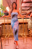 Absolutely love this dress! The off-shoulder style is very flattering, and it fits me perfectly. The fabric is soft, stretchy, and comfortable to wear, while still holding its shape nicely. The color is beautiful and looks exactly as pictured. The quality exceeded my expectations for the price. Overall, it's stylish, comfortable, and very well made. I received so many compliments wearing it! - Gitanjali M.