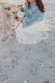 This skirt was exactly what I was looking for for a beachy photo shoot. It was tts, and I loved the lace detail. It does get caught on stuff and can snag, so be careful, but I loved it! - Katie W.