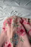 The dress is very long for me being 5'3. I had to get 6 inches taken off the bottom and within 30 minutes of being at a wedding the dress started to fall apart. The top was completely ripped. Not good quality. - Ava B.