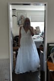 Beautiful dress, but at my age, my underarm flab showed too much. Also, something that was unflattering was the gathered skirt. Even though I'm slender, I felt the style made me look more rotund. The gown itself is beautiful and I'm sure on the right body type it would be stunning for a summer/garden wedding. - Annie B.