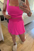 Super cute little outfit. I wanted a two piece and like how the bottoms are high enough and the top long enough to just show a tiny amount of skin (short torsoed here). It was a little too tight in the waist for me. Standing room only. The top was cute, [except for] this weird leftover fabric under the chest. Looks great lying flat, but too weird on me. I will sadly be returning. - Andrea B.