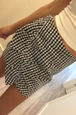 I like this skirt, but it's thinner/cheaper fabric than I had hoped for. 

The waist size is okay, it could be tighter so if you have a really skinny waist, keep that in mind! 

The length is perfect, not too short or too long on my 5'8" frame. I really like the design with the ruffle and the print, it's cute and summery. Great fabric for super hot weather since it's on the thin side. 

It'll look super cute with black or white tops and strappy sandals. Can be dressed up or down. I can't wait to wear when the weather gets warmer! - Tiana B.