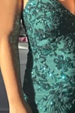 This is the most beautiful dress you're going to wear in your life. Don't think for a second whether to buy it or not. The moment I tried it on, it fits my body, it is elastic and comfortable. The sparkles are so beautiful and elegant. If you are a short person like me (157cm) it is most likely that you will find it a little bit long. - Guadalupe B.