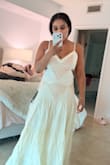 Absolutely love this dress! It is even more beautiful in person and fits so well. The side cutouts are very flattering and add the perfect amount of detail without being too revealing. The fabric and overall quality exceeded my expectations, and it feels elegant and perfect for vacation or a summer event. One of my favorite purchases! - Shani M.