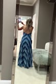 I'm 5'3 and a little busty. I was concerned it was too revealing but husband gave the the thumbs up. Purchased a small. - Teresa S.