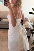 I bought the dress for my reception outfit and I absolutely love it. I can't wait for my big day!!! I like my clothes a little bit tighter to show off my figure, and this is absolutely perfect. I was debating on whether or not I should go with a small or a medium, but I'm happy I got a small!! - McKenna L.