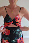 I wanted to love it but the top just did not fit! My waist fits a medium, but I could have done a small. The top was loose and even with some sticky boob enhancement, they still would have been a wardrobe malfunction waiting to happen. - Ashley H.