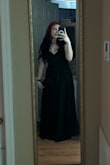 I just recently lost weight and wasn't sure about the medium. I'm very glad I went with that size. It fit snugly and was flowy where someone with a mom pooch would want it to be. Overall in love with the dress! - Ariana G.