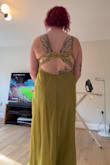 I am obsessed with the color of this dress, and I love the cutouts in the back. The reviews were right about the bust, though if you have a big chest, this dress may not be for you. I am a 38DD size 12/14, and I felt like I was busting out (even more so than the attached photo). I loved it so much, I took the risk. I'm keeping the dress, but I can only wear it on a super bold/sexy night out; otherwise, it feels too risqué. - Jessica S.