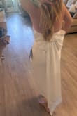 I love this dress! Fit is superb, the fabric is so nice, the length is perfect for me and I LOVE the bow. I didn't have issues with it coming unsnapped. - Emily G.