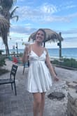 This dress fits true to size and perfectly! Good length, which I typically struggle with, too short, but this was perfect. Great quality satin material- 10/10 recommend. Will be taking this on my honeymoon too! - Darion M.