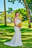 Ordered this for our destination wedding in Jamaica. I ordered a medium, and it fit extremely well! It traveled beautifully; I didn't have to worry about wrinkles at all. Was light enough that I wasn't completely dying in the heat at the end of June, but heavy enough to withstand the ocean breeze. - Stormy S.