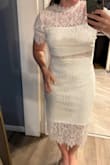 I bought this dress for my bridal shower, and it is absolutely perfect! It's so classy, fits well, and is good quality. The only thing is it's just slightly tight on my shoulders if I raise my arms, but I have more athletic arms. Otherwise it's perfect! - Bree-Anna B.