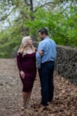 I purchased this dress for our engagement photos, and it was perfect! It was form-fitting enough without being too sexy, but the material is stretchy and forgiving. It's a "bit" long for us shorter ladies, but it really didn't matter with heels. I wore shapewear to smooth out any lines, and a strapless bra because straps would have probably shown in the front. Just something to keep in mind. I love this dress and plan to wear it again in the future! - Gen N.