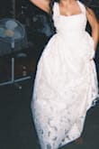 Chose this as my wedding dress for a summer barn wedding since I didn't want to spend lots of money for a dress that I might not wear many times. The length was perfect. I ordered a large to have room for tailoring since I have a larger bust, but wanted it to fit my small waist (it's not tight around the belly though so enjoy your food!). Tailoring was no problem. The dress has three layers and the bottom layer is quite smooth but synthetic. I was worried since it was super hot that day, and I brought an extra dress but never had to change. It was super comfy and nice on the skin. I walked a lot in grass and soil, danced for hours and it still looked amazing! - Rebecca L.